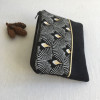 Mini pochette jacquard palmettes noir et or