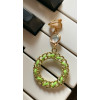 Fils de coton vert clair et sa perle de nacre