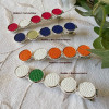 Barrette pince avec puces de cuir de couleur sur base argentée