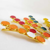 barrette crocodile avec puces de cuir sur base cuivre doré