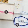 Bracelet cordon pastille croix